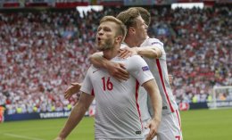 Jakub Blaszczykowski celebrates after scoring the opening goal during the Euro 2016 round of 16 match against Switzerland. AP