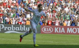 Grzegorz Krychowiak celebrates after scoring the winning penalty against Switzerland. AP
